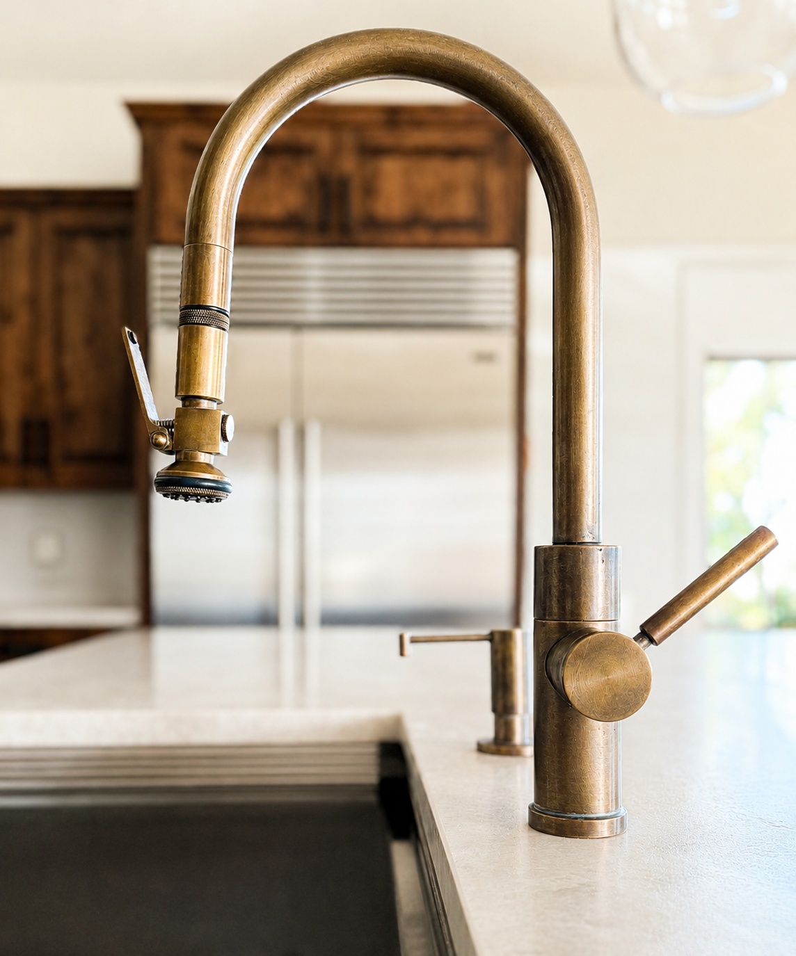 antique brass kitchen faucet with stainless refrigerator in littleton co kitchen remodel
