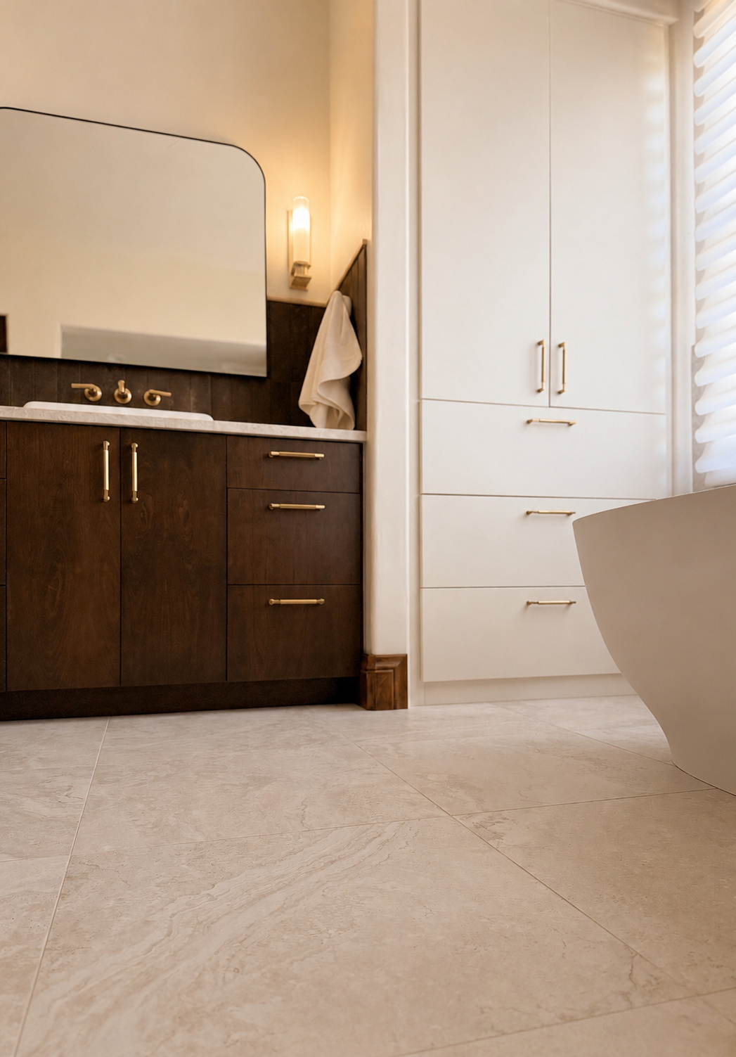 dark wood bathroom vanity and tall white storage cabinet in littleton co kitchen and bathroom remodel