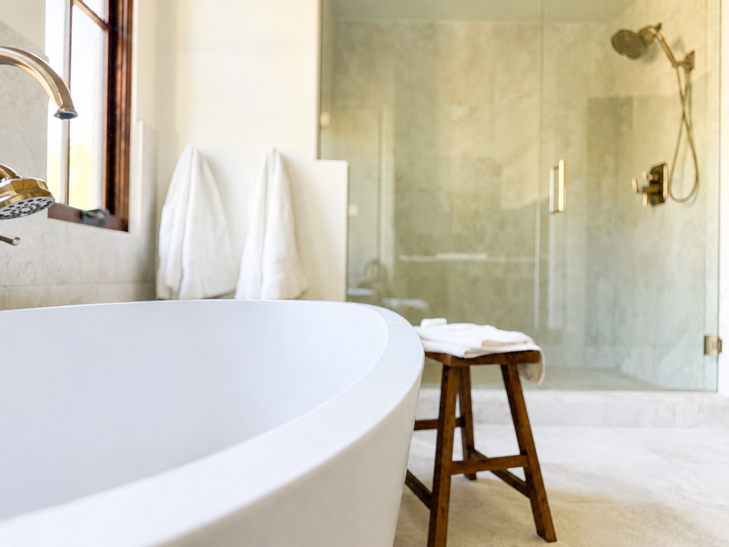 freestanding tub and glass enclosed shower in littleton co kitchen and bathroom remodel