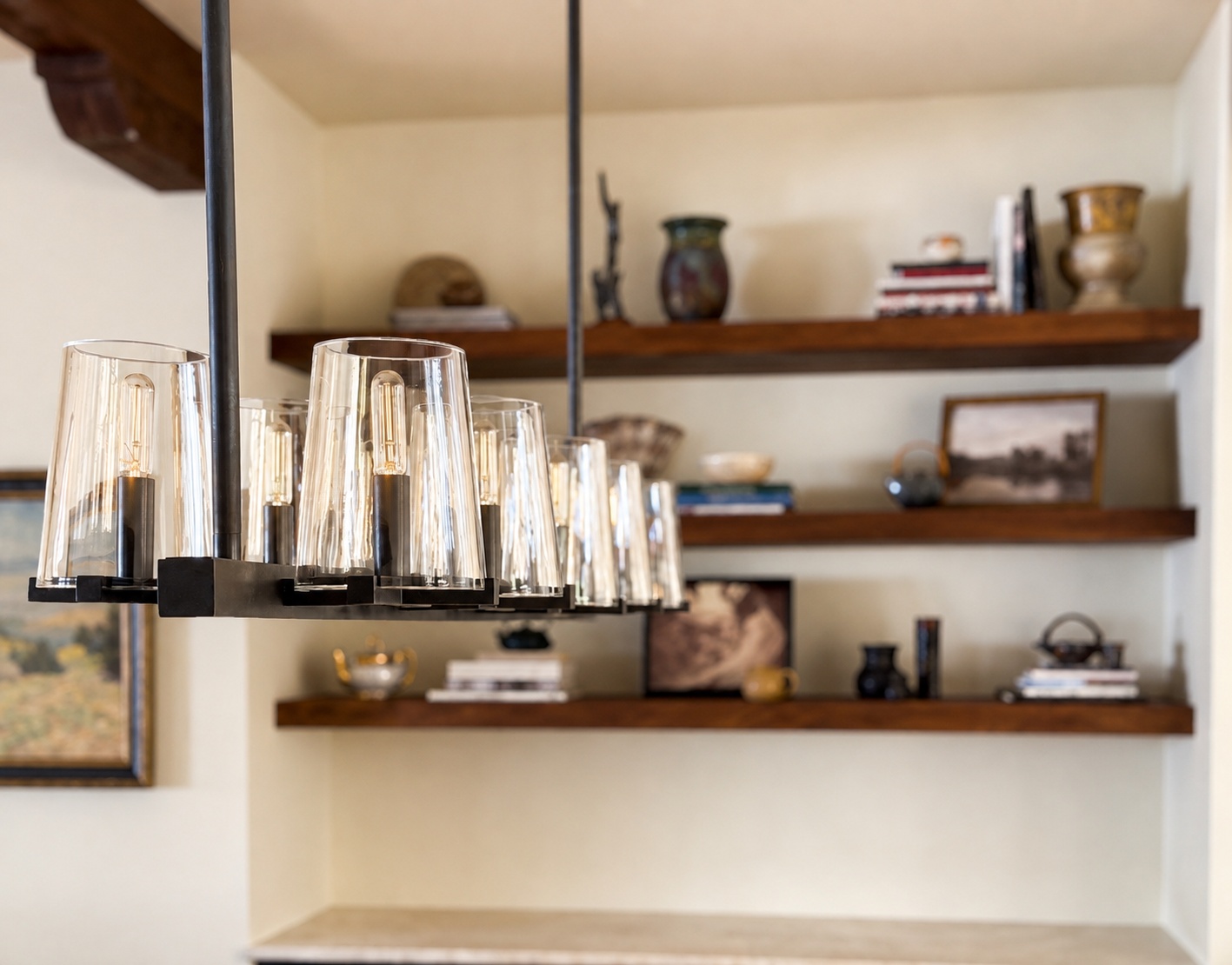 glass chandelier with floating wood shelves in littleton co remodeled dining area