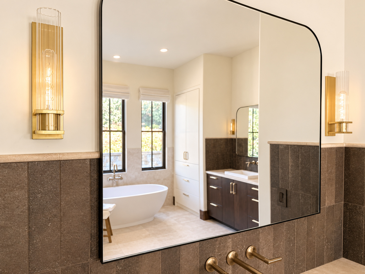 large bathroom mirror with brass sconces dark tile and vanity in littleton co kitchen and bathroom remodel
