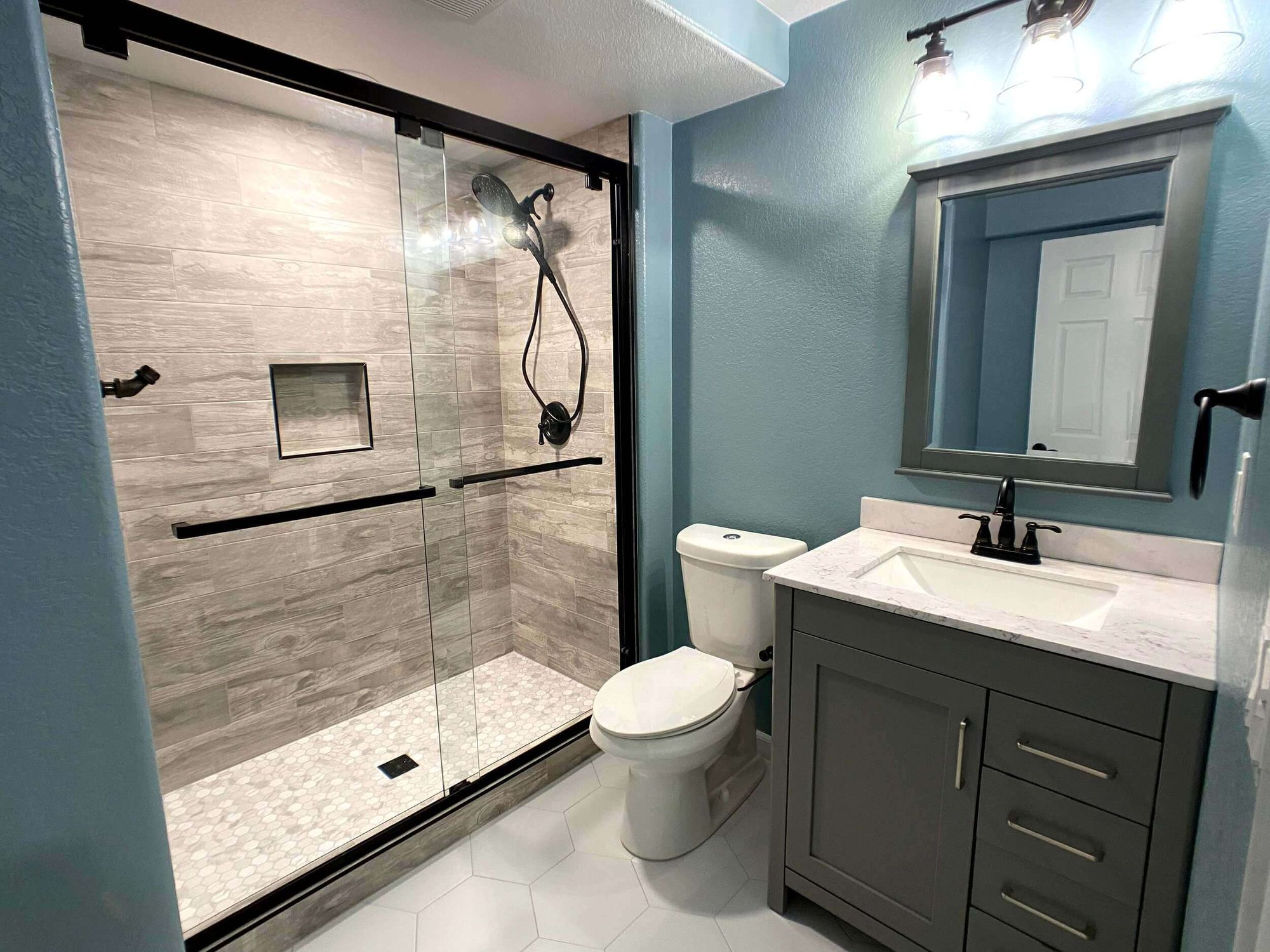 Blue-bathroom-dark-cabinets-Littleton-Colorado