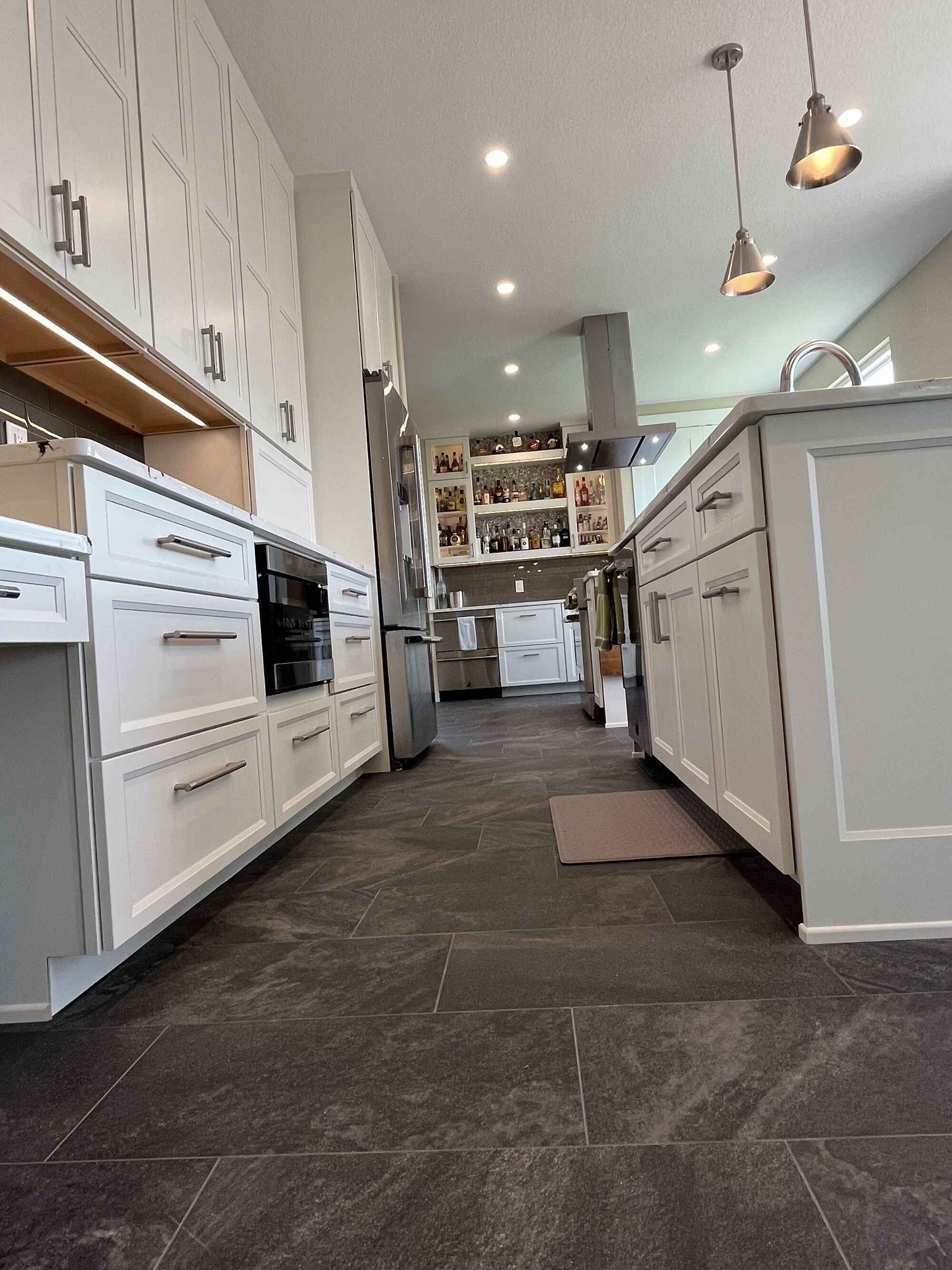 Beautiful-bright-kitchen-white-shaker-cabinets-double-island-Littleton-Colorado