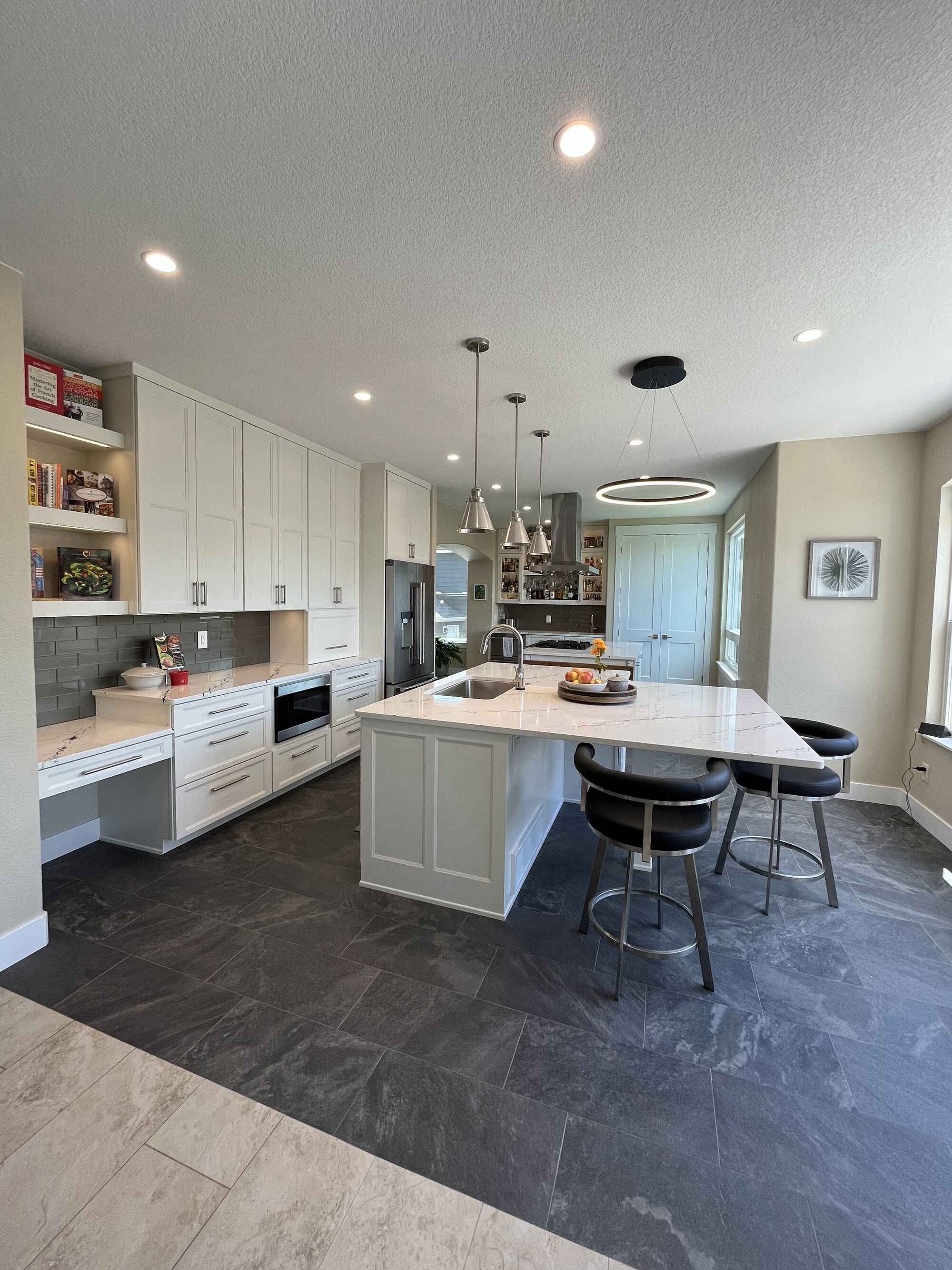 Beautiful-bright-kitchen-white-shaker-cabinets-double-island-Littleton-Colorado