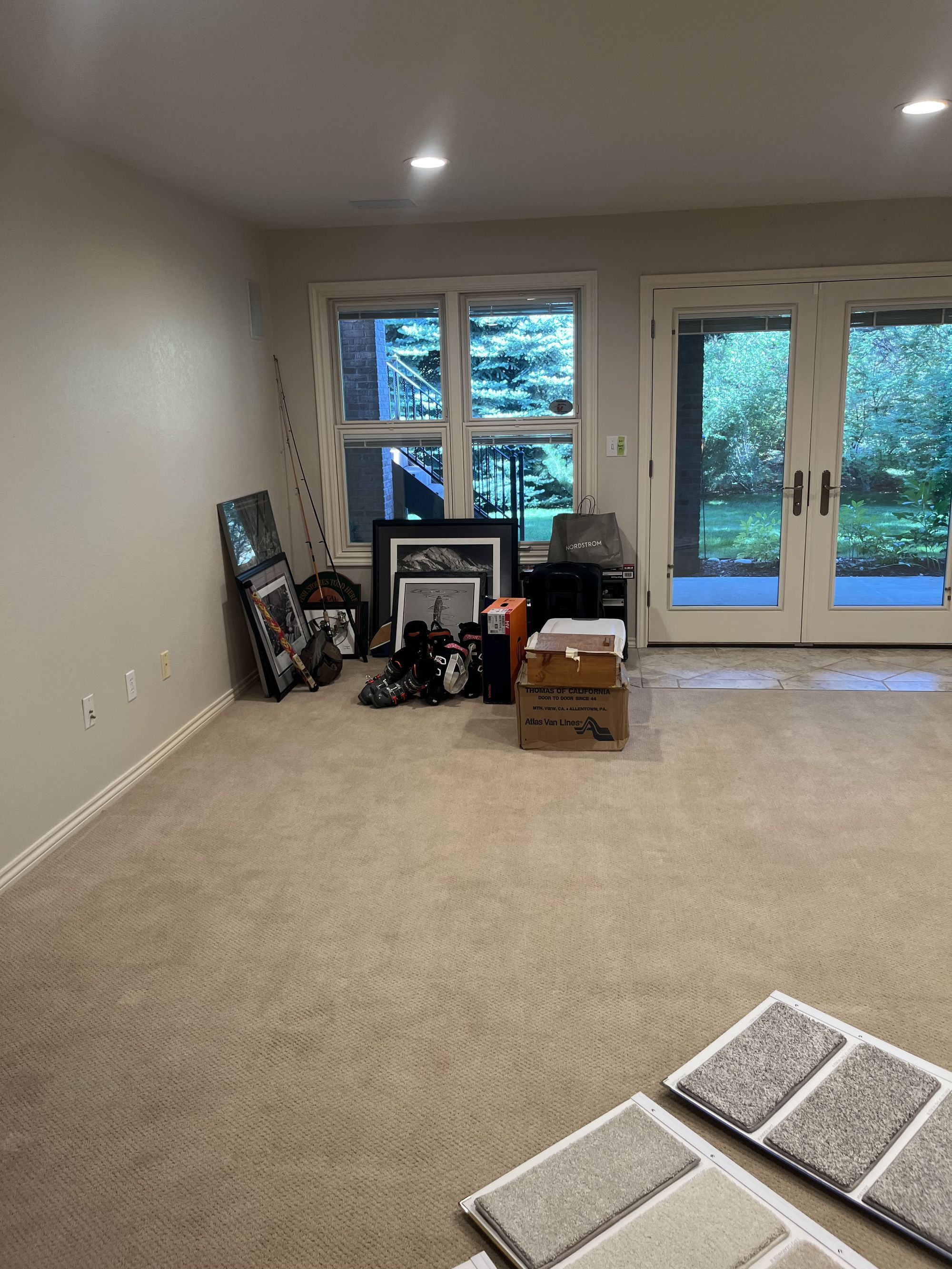 before basement remodel unfinished basement living room with carpet flooring in littleton