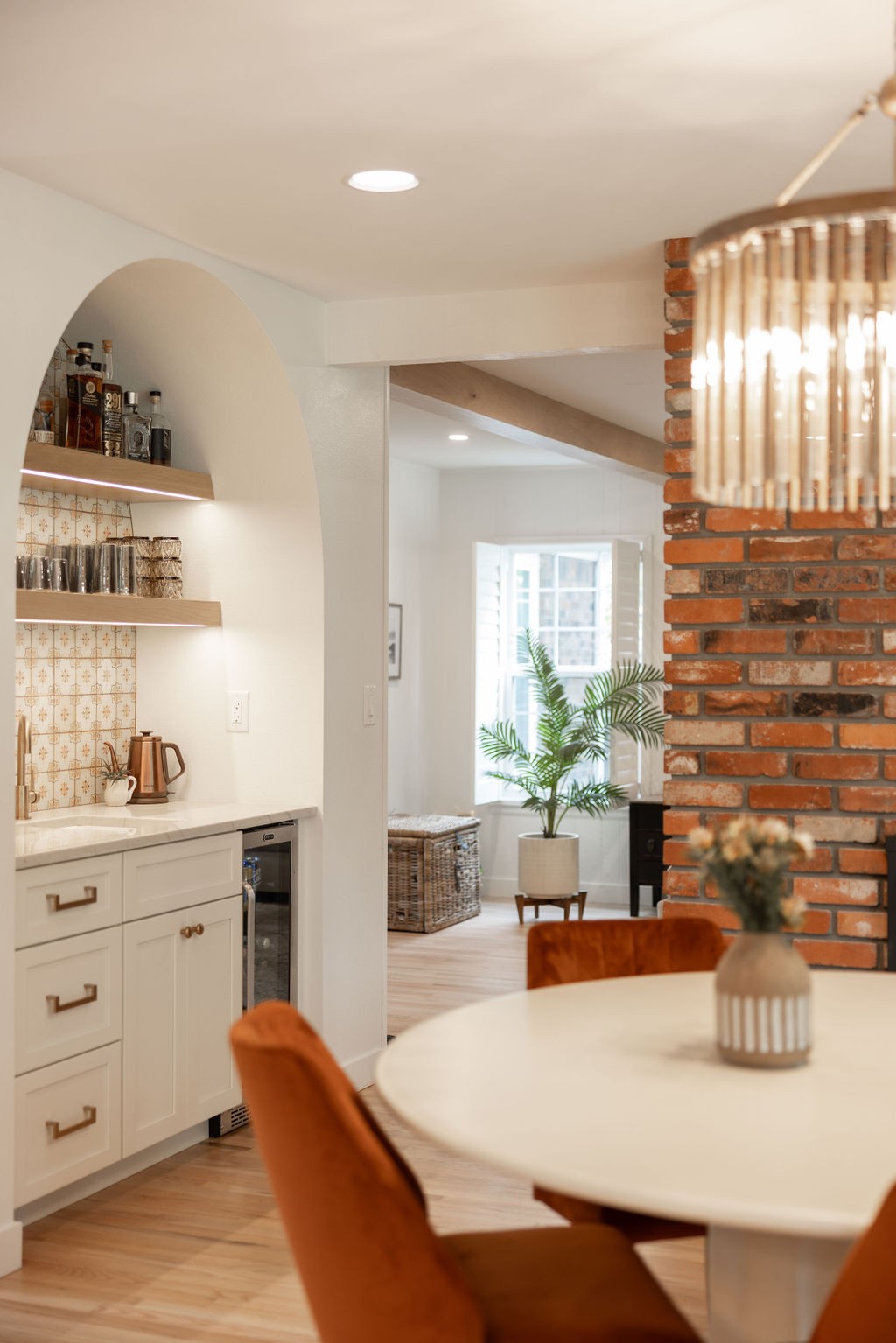 after-littleton-kitchen-remodel-dining-area-with-modern-chandelier-and-round-table