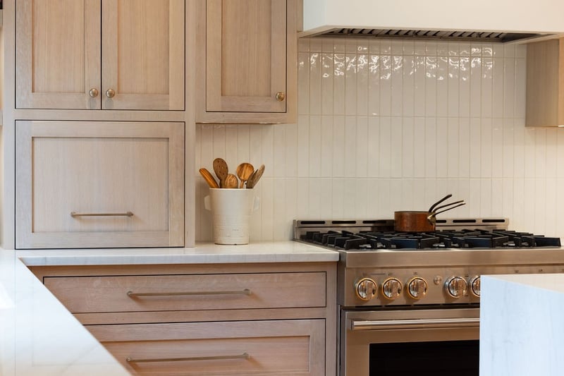 after-littleton-kitchen-remodel-modern-linear-pendant-lighting-over-kitchen-island