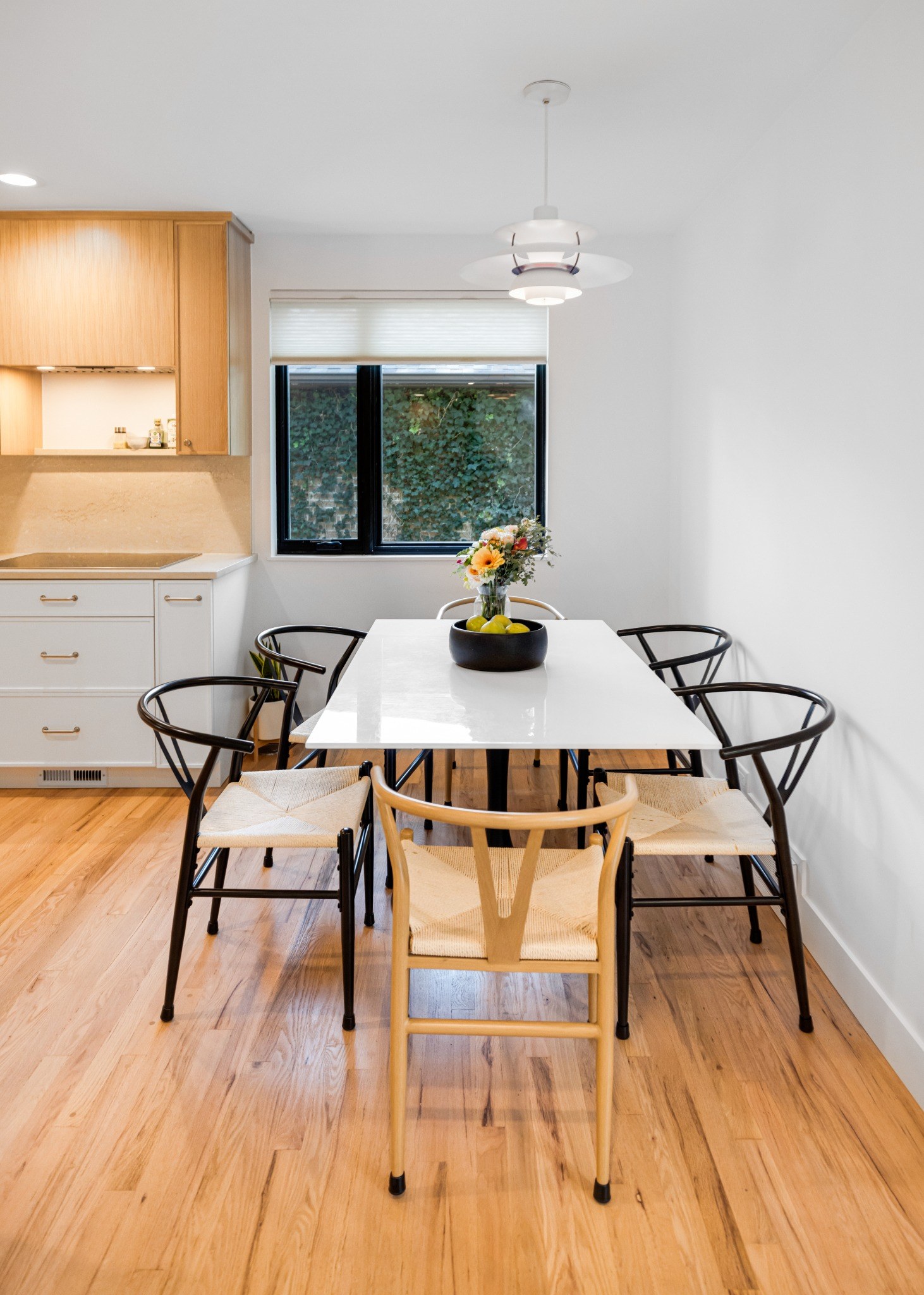 after-denver-whole-home-remodel-modern-dining-space-with-designer-lighting