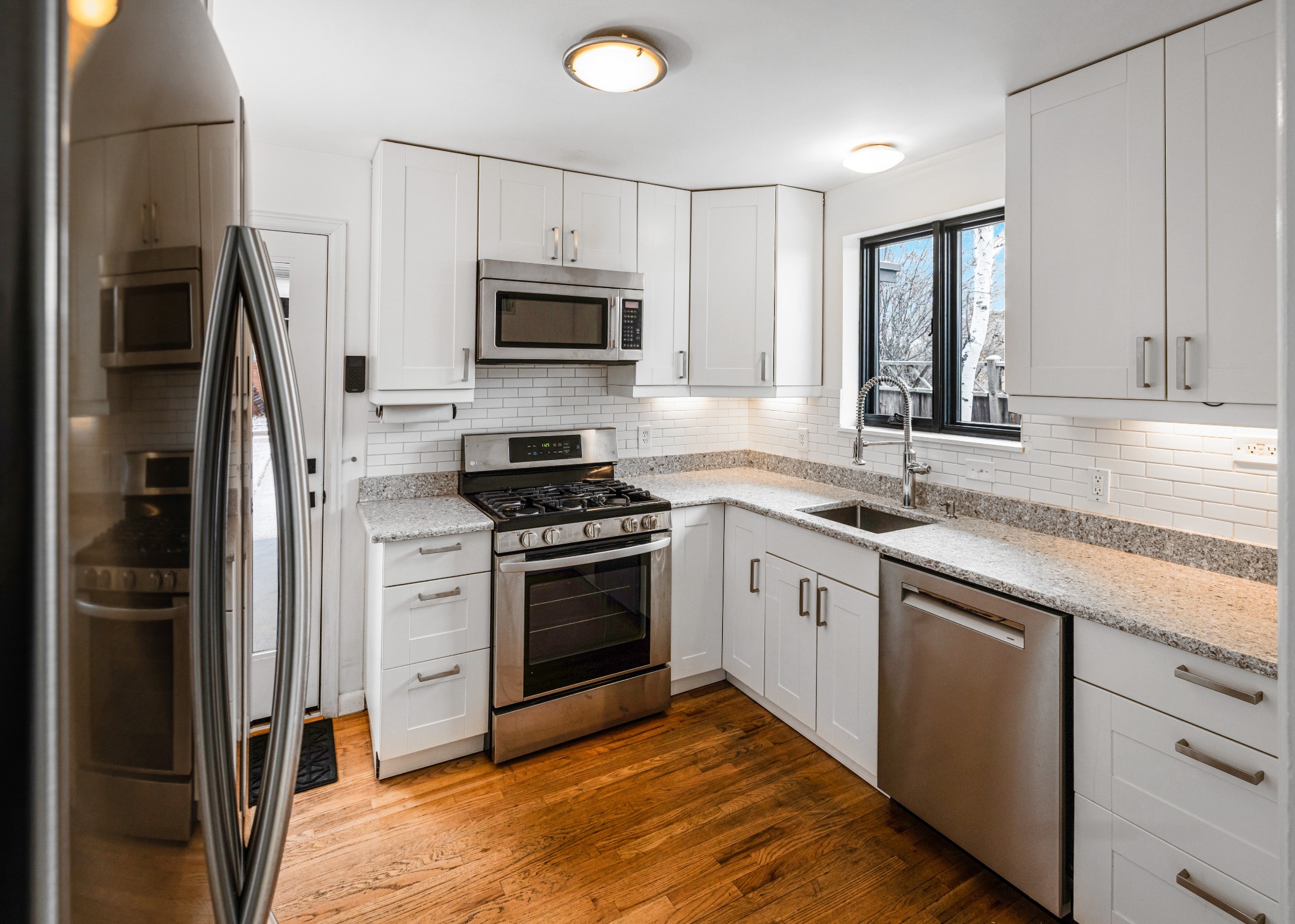before-denver-kitchen-remodel-small-u-shaped-kitchen-with-stainless-appliances