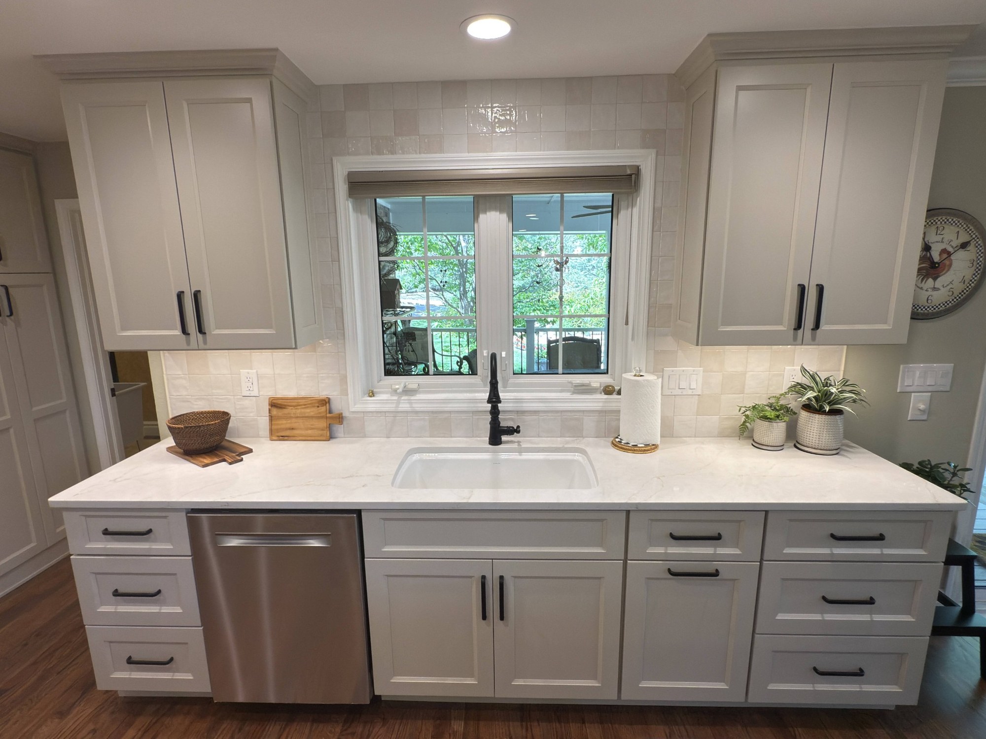 after-littleton-kitchen-remodel-long-sink-wall-with-white-cabinets