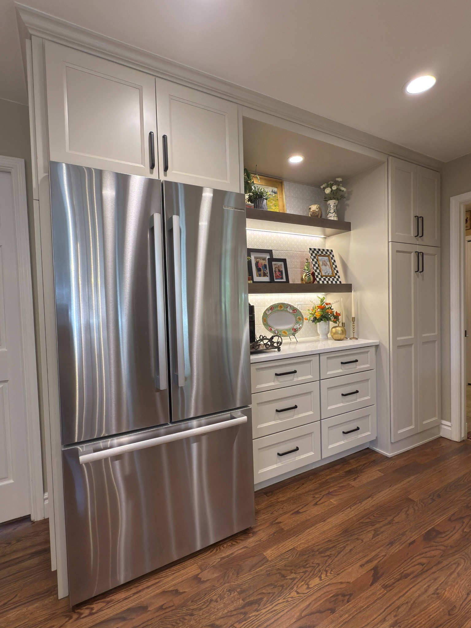 after-littleton-kitchen-remodel-refrigerator-wall-with-coffee-bar-and-tall-cabinets