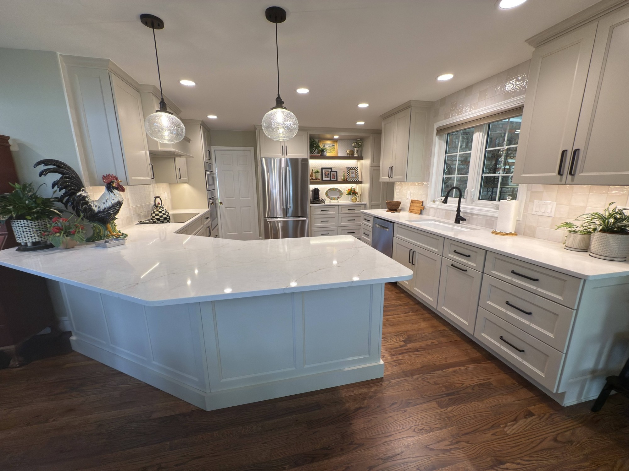 after-littleton-kitchen-remodel-sink-wall-with-white-countertops