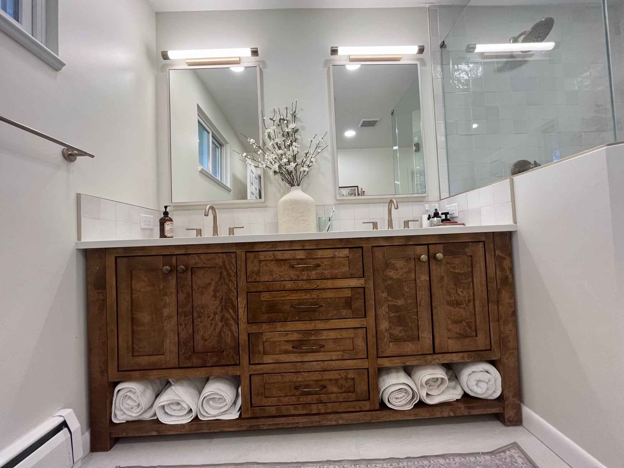 Bright-master-bathroom-white-tile-gold-fixtures-Littleton-Colorado2