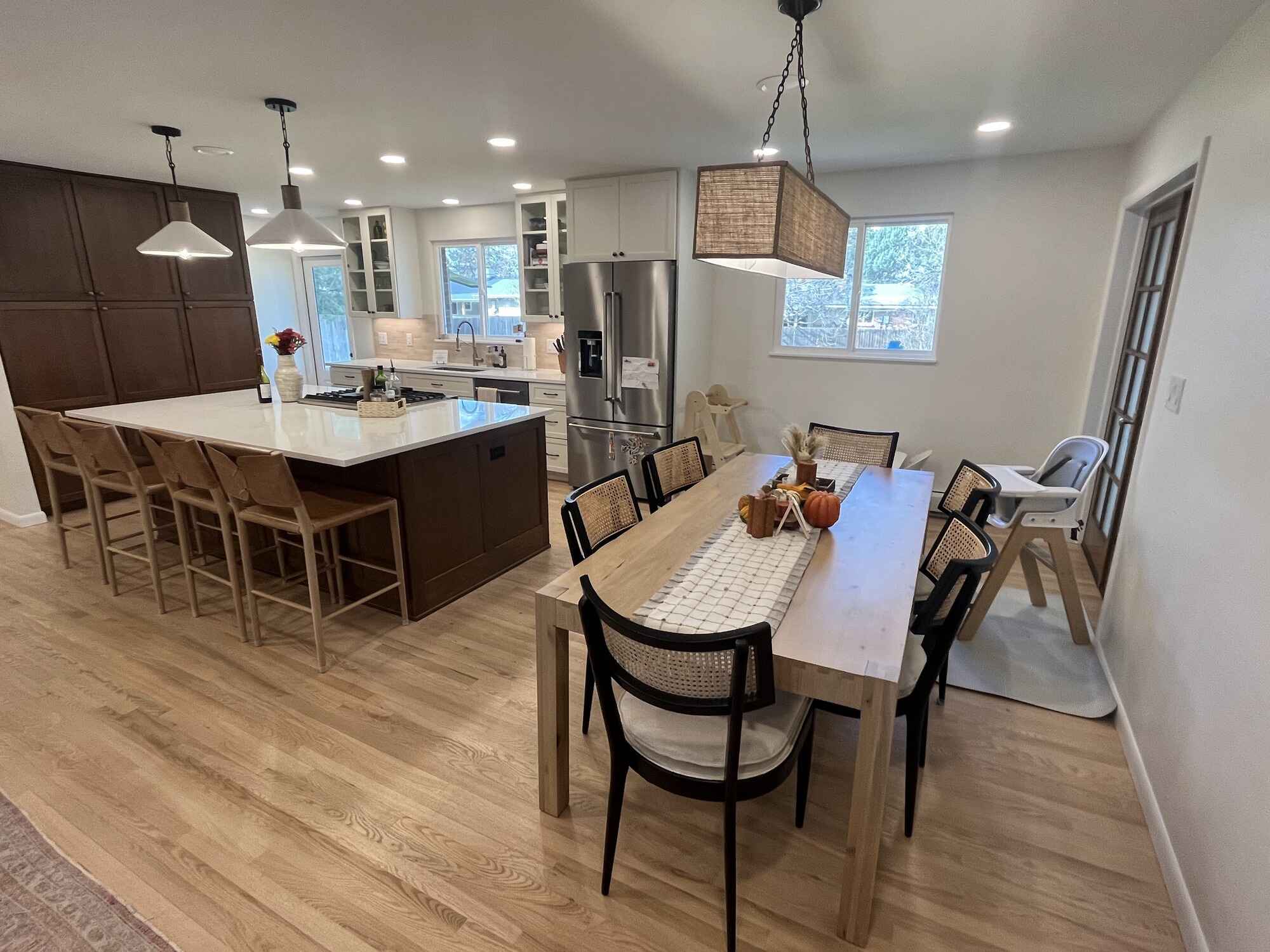 Bright-open-kitchen-large-island-wood-shaker-cabinets-quartz-countertops-Littleton-Colorado14