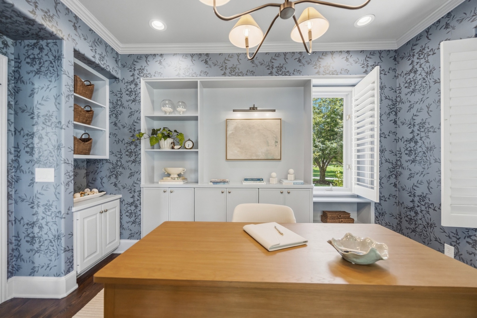 home office with blue floral wallpaper and built in cabinetry in greenwood village co whole home remodel