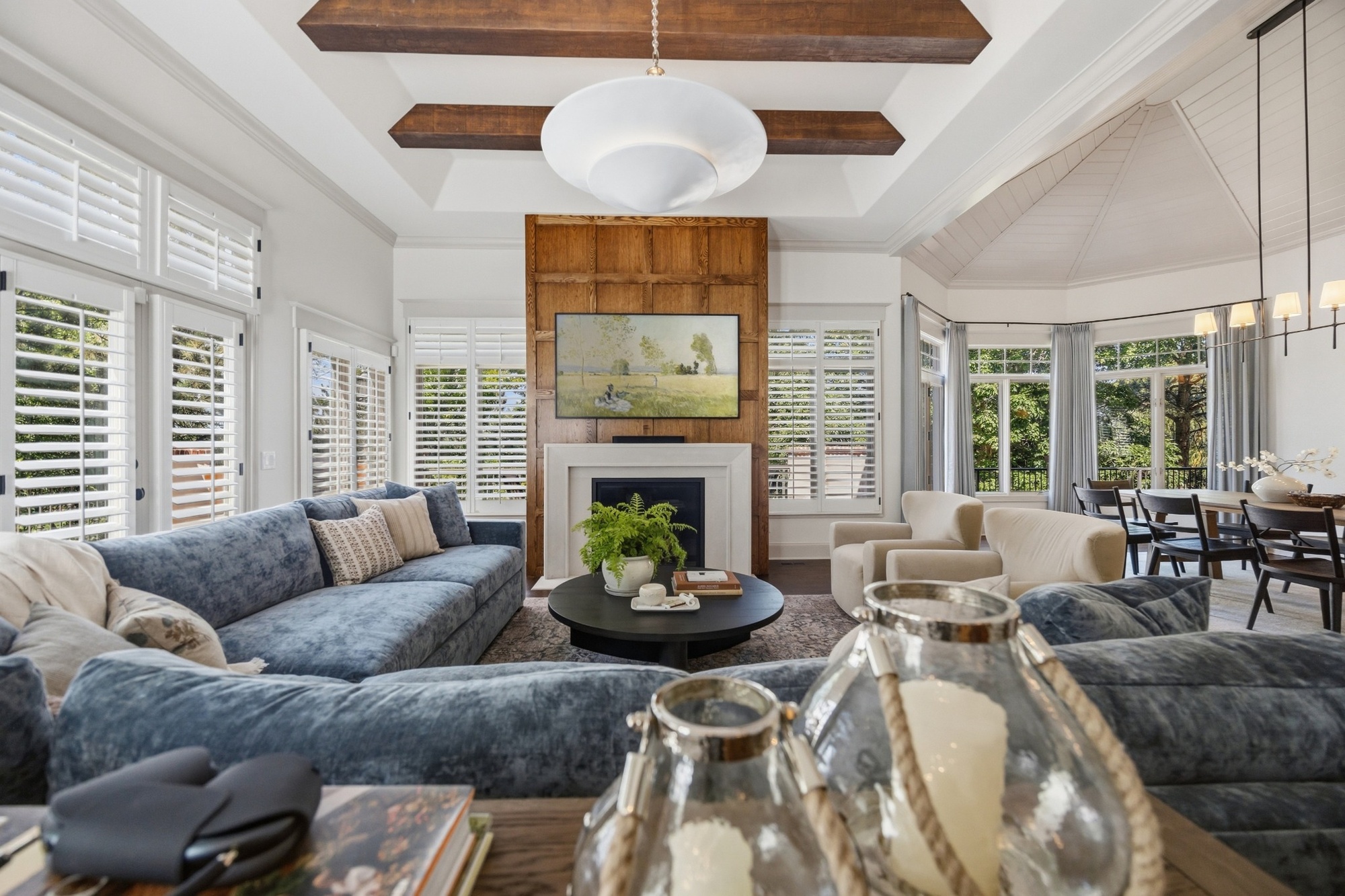 whole home remodel living room with fireplace wood accent wall and vaulted ceiling in greenwood village co