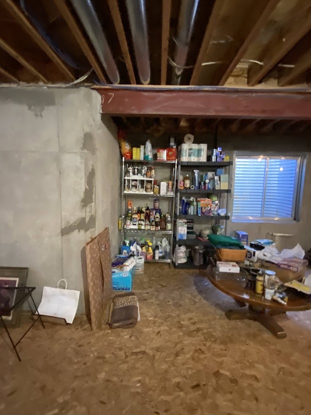 before highlands ranch basement remodel unfinished basement storage space with open shelving and exposed ceiling