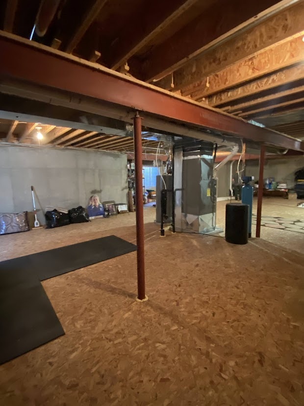 before highlands ranch basement remodel utility area with furnace water heater and exposed ductwork