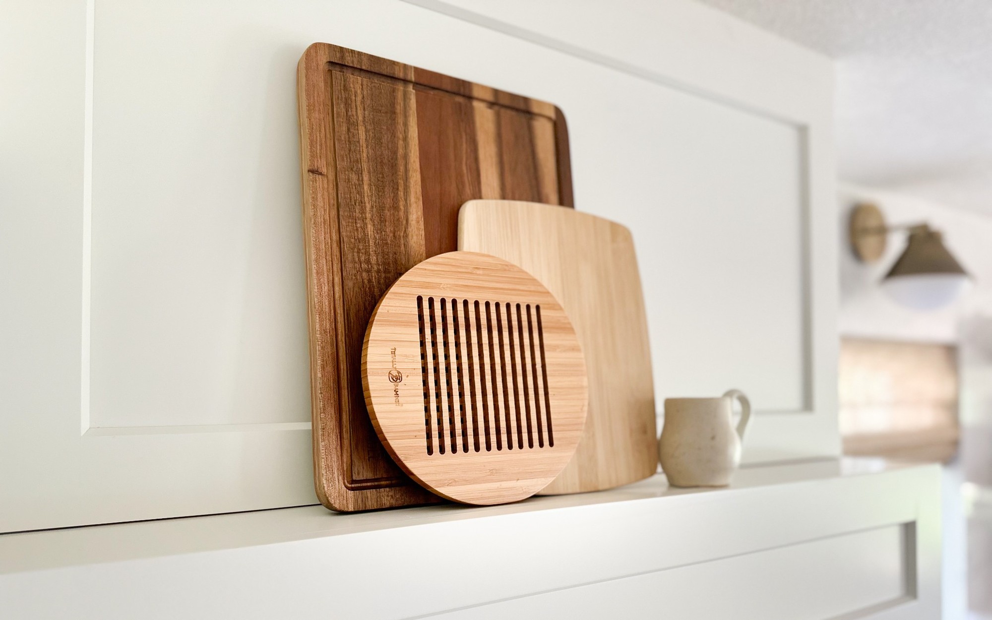 after-littleton-kitchen-remodel-cutting-board-display-above-range-hood