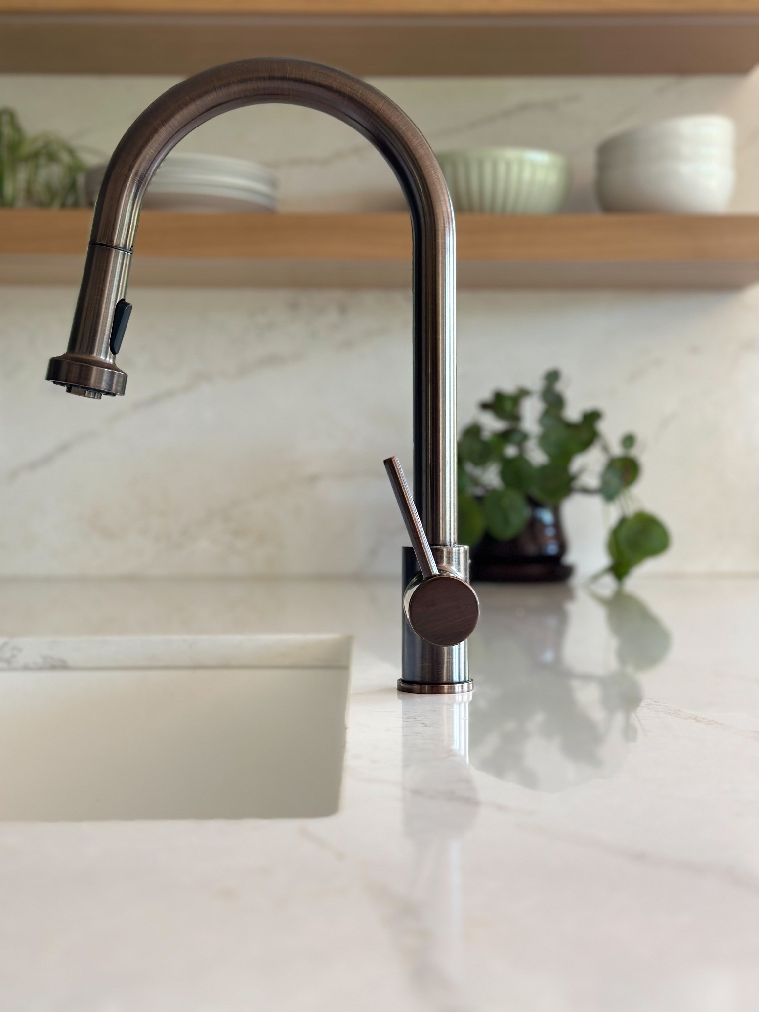 after-littleton-kitchen-remodel-faucet-and-sink-close-up-with-open-shelves