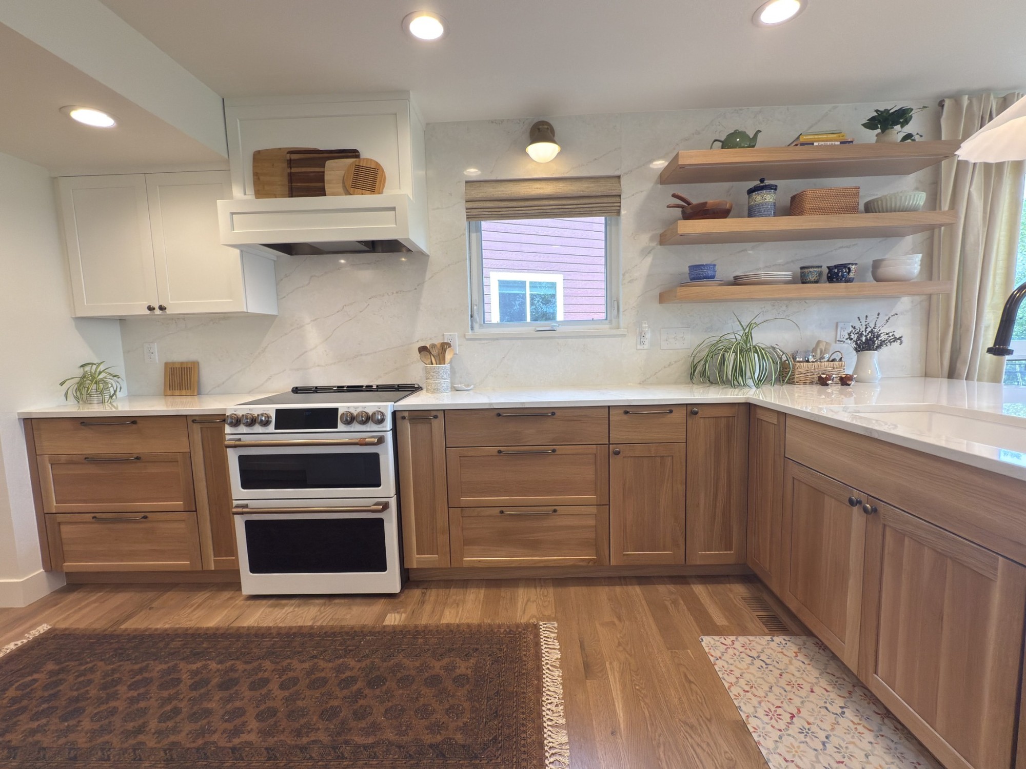 after-littleton-kitchen-remodel-white-range-and-wood-cabinet-wall