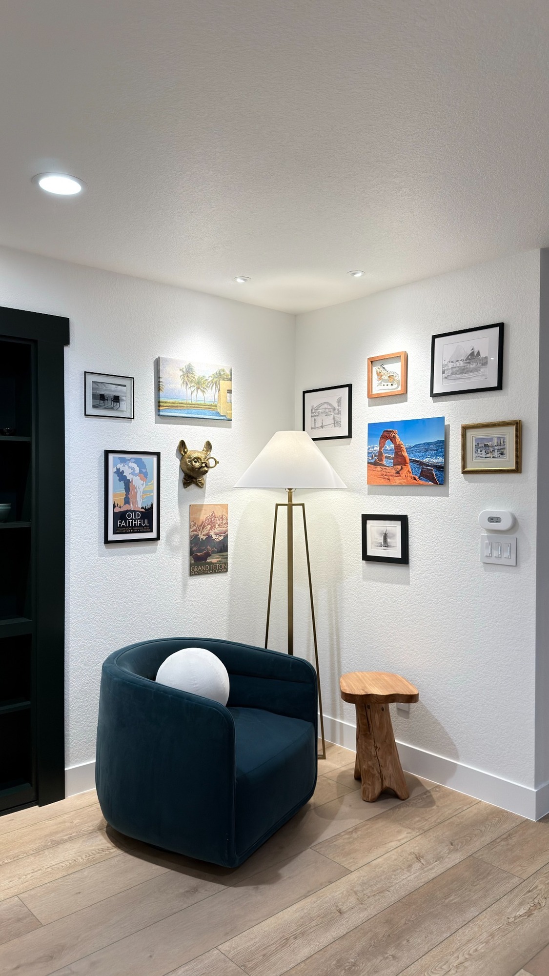 cozy seating area with artwork in golden basement remodel
