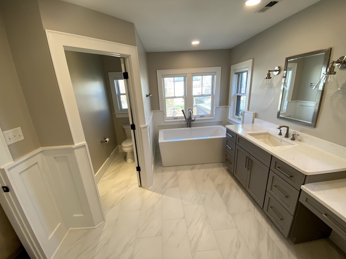 denver bathroom remodel after freestanding bathtub with natural light