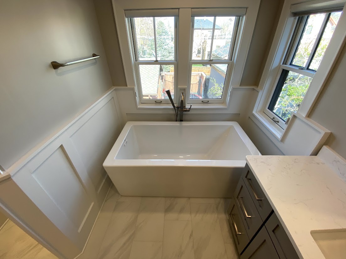 denver bathroom remodel after gray vanity and freestanding bathtub