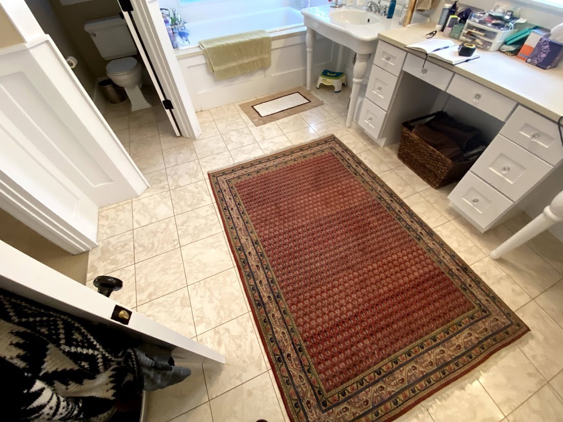 denver bathroom remodel before tile flooring and bathroom rug