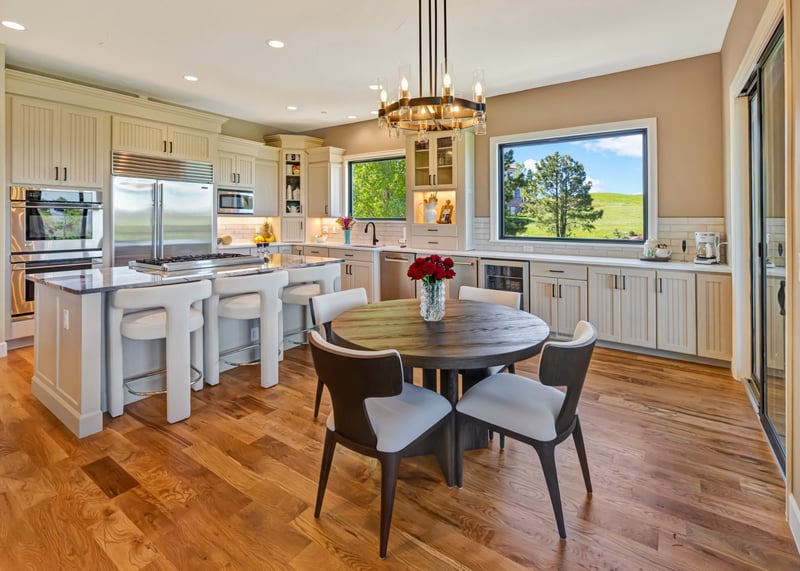 castle pines whole home remodel contemporary kitchen with wood flooring and panoramic windows