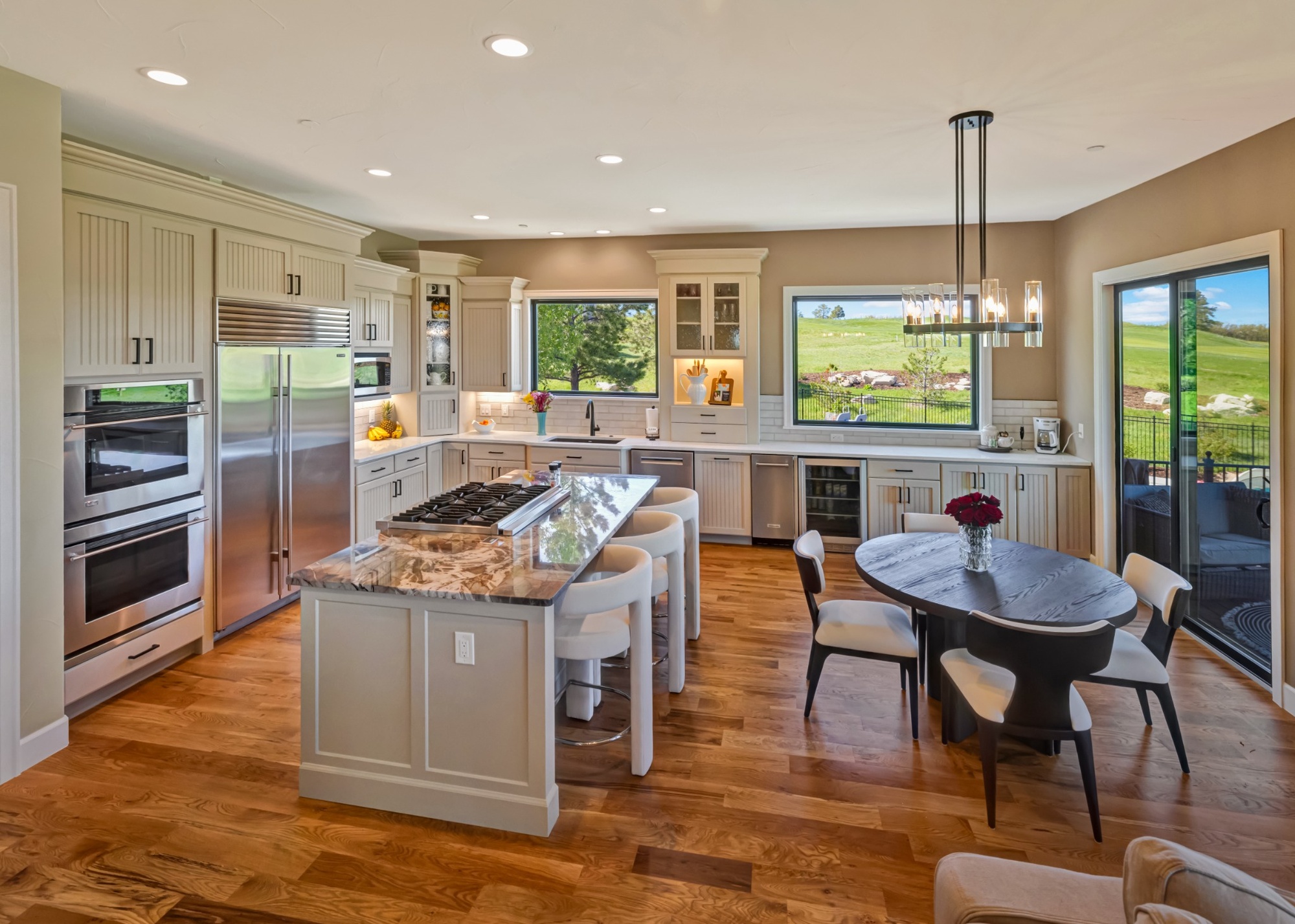 castle pines whole home remodel gourmet kitchen with marble island and custom cabinetry