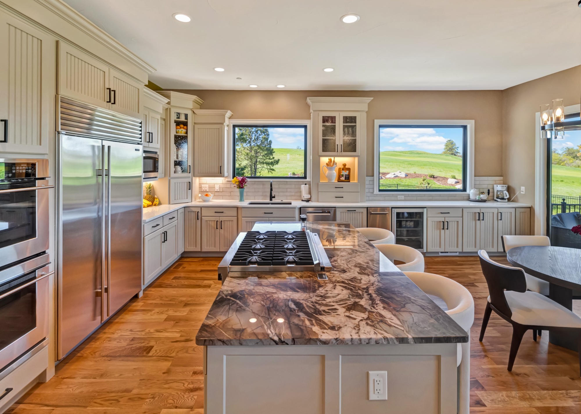 castle pines whole home remodel modern kitchen with large island and dining area