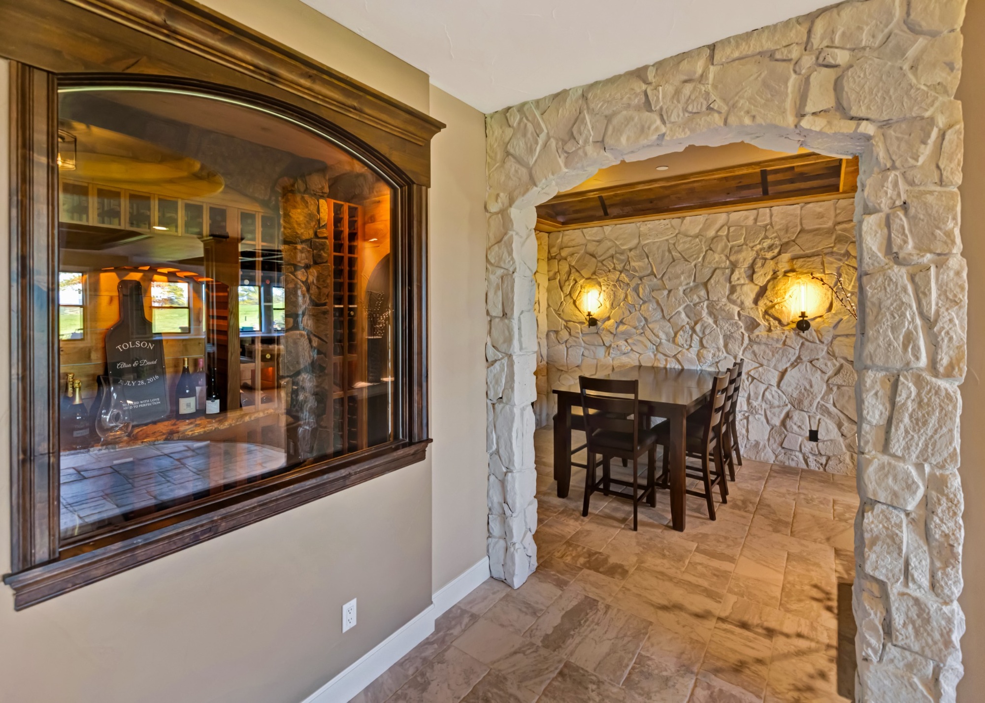 castle pines whole home remodel stone dining alcove with custom wine display