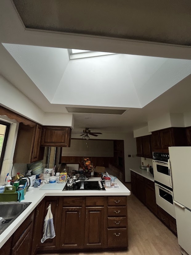 before skylight kitchen with peninsula in littleton whole home remodel