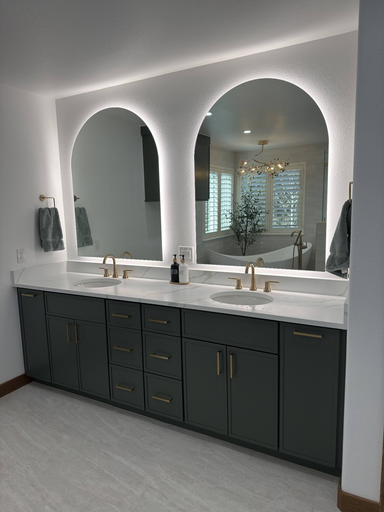 after littleton bathroom remodel dark double vanity with arched illuminated mirrors