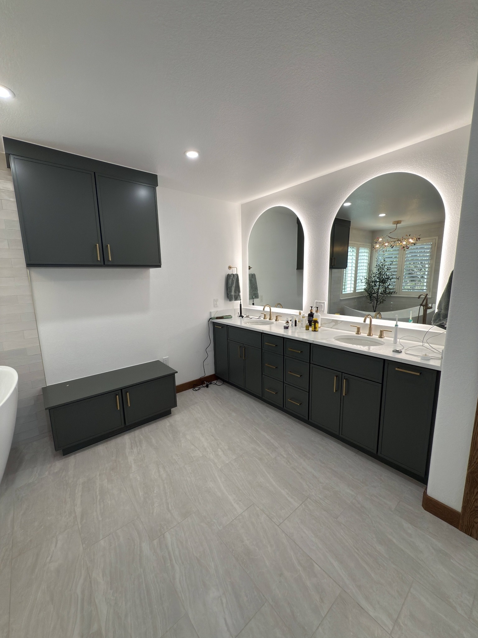 after littleton bathroom remodel double vanity with arched lighted mirrors and dark cabinets