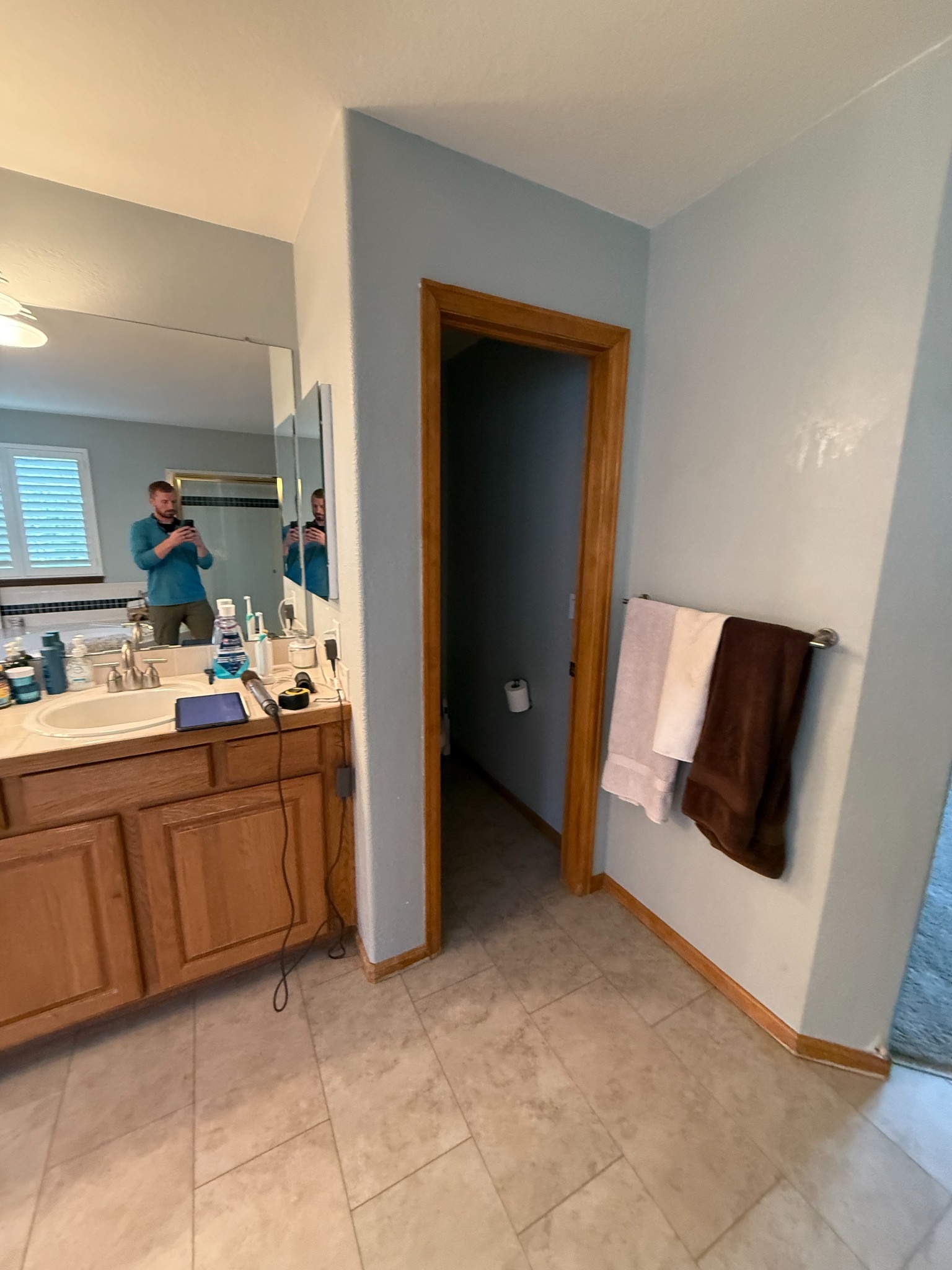 before littleton bathroom remodel vanity area beside private toilet room and bedroom entrance