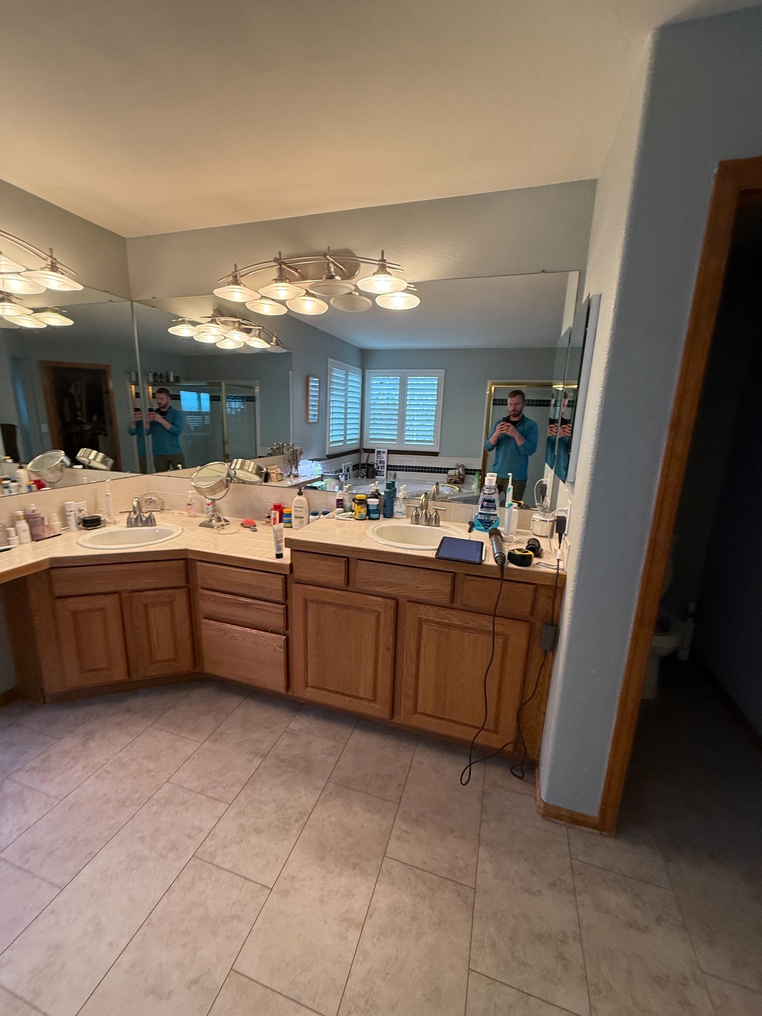 before littleton bathroom remodel with large double vanity and wall mirror