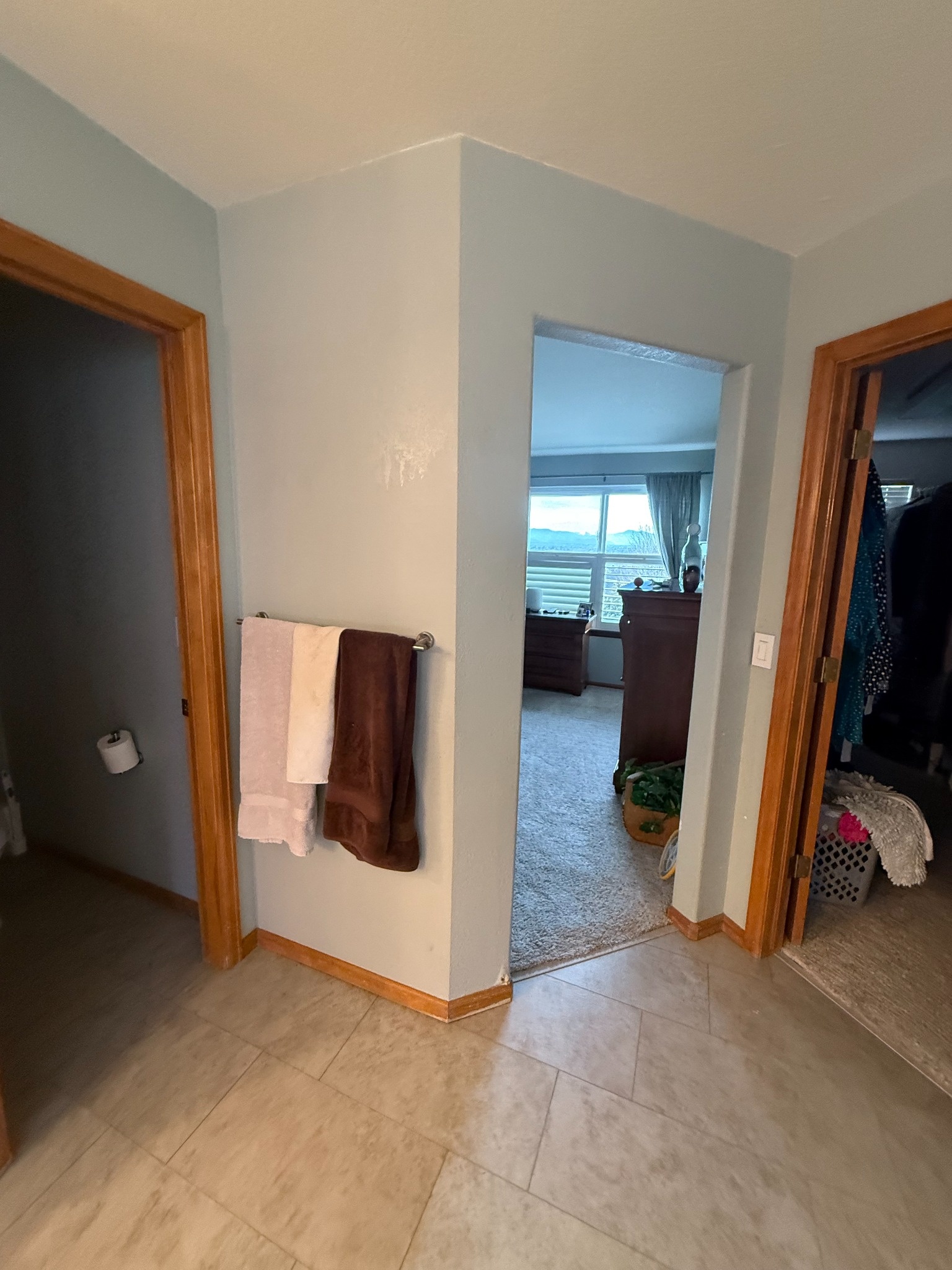 before littleton bathroom remodel with tiled shower and walk in closet entrance
