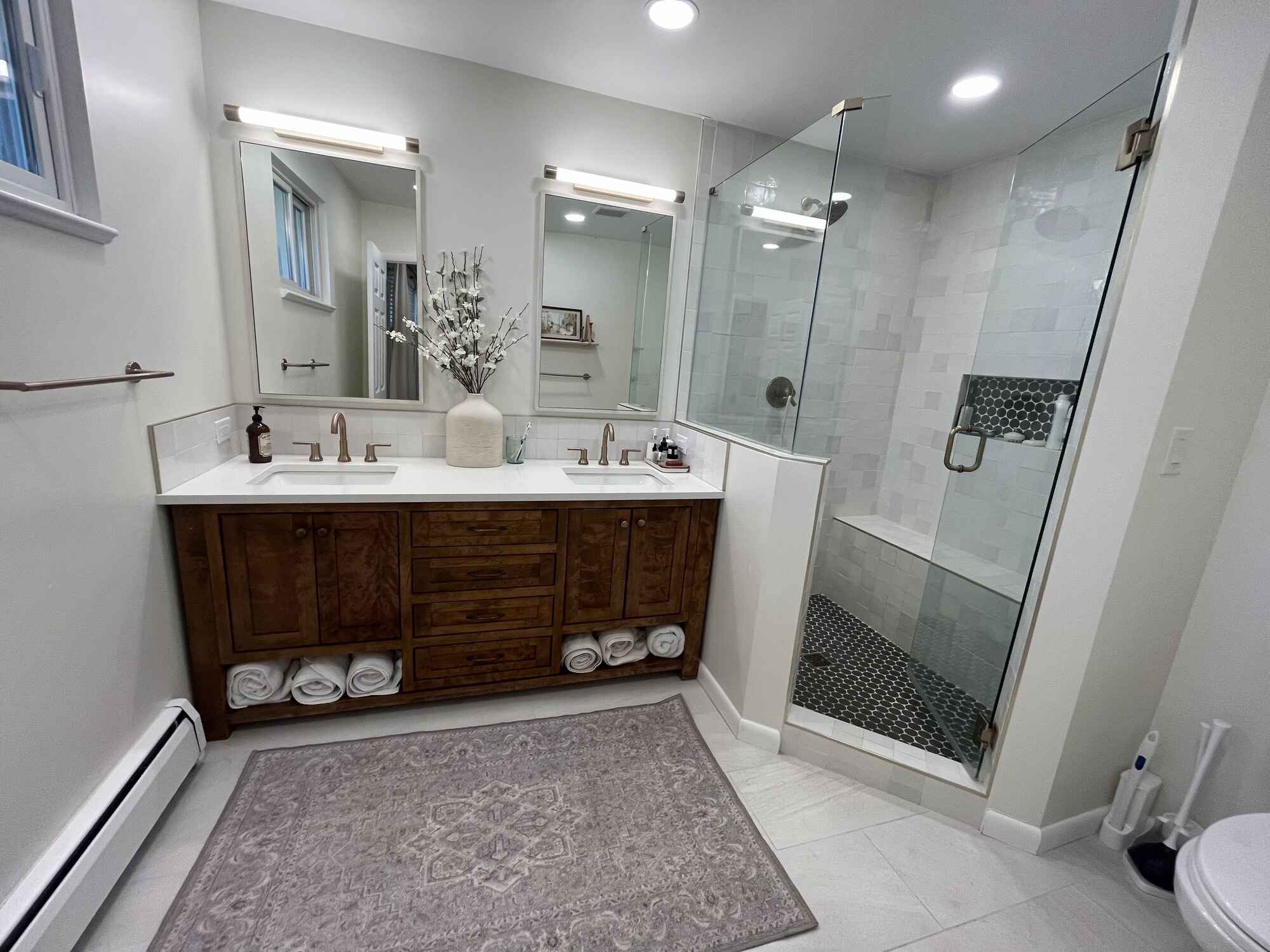 Bright-master-bathroom-white-tile-gold-fixtures-Littleton-Colorado15
